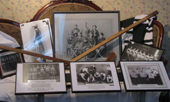 Historic hockey photos and wooden hockey sticks at the Birthplace of Hockey Museum in Windsor Nova Scotia